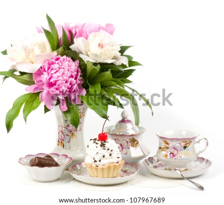 Vintage teacup with flowers,cake