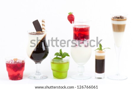 Tasty colorful jelly with coffee, berry and fruits on a white background