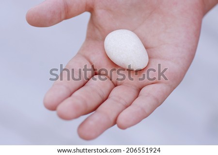 Stone in little hand
