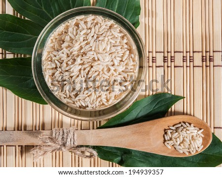 Brown rice on bamboo tray