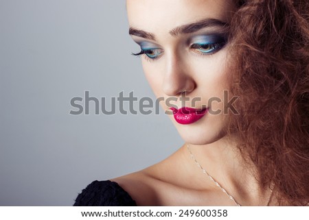 fashion capture beautiful bright girl with bright makeup, portrait closeup
