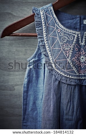 Old Fashion Girls Dress on a Clothes Hanger; Close up