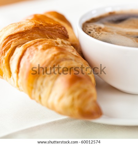 Croissant and a cup of delicious coffee