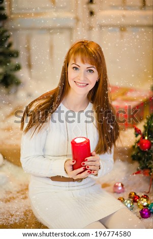 Portrait of  pretty woman with candle