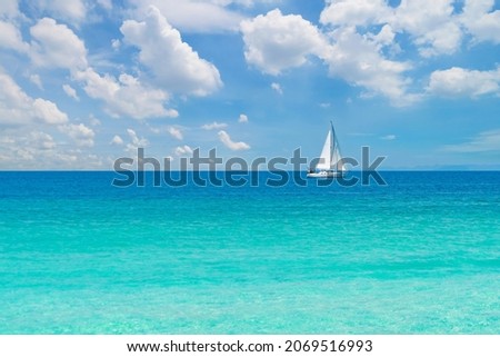 Similar – Image, Stock Photo Calm sea near hill under cloudy sky in foggy weather