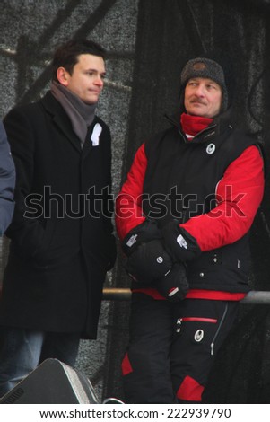 Moscow, Russia - February 4, 2012. Politician Ilya Yashin and economist Sergei Aleksashenko on the stage of opposition rally. The March and rally for fair elections