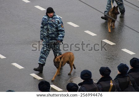 Moscow, Russia - March 1, 2015. The Russian police and dogs on oppositional march. March to the memory of Boris Nemtsov, Russian opposition leader who was assassinated on the eve of