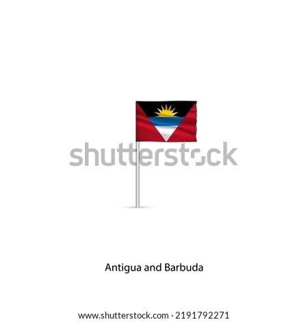 National flag of Antigua and Barbuda on a gray pole.