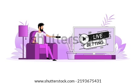 Man sits on the couch, they switch the channel on the TV - Live betting