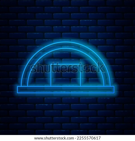 Glowing neon line Warehouse icon isolated on brick wall background.  Vector