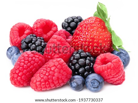 Berries collection isolated on white background. Fresh mix berry set isolate composition, raspberry, blackberry, blueberry, strawberry. Berries macro studio shot cutout. Full depth of field closeup.