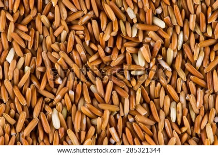 Brown rice grains background