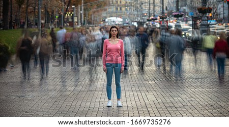 Image, Stock Photo Lonely woman (blurred) walking across the street