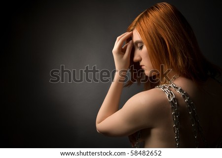Woman with chain in her hand
