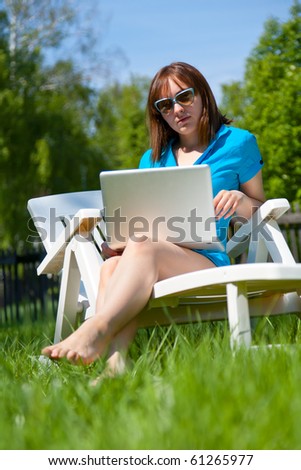 Sitting woman enjoying the sun outdoors
