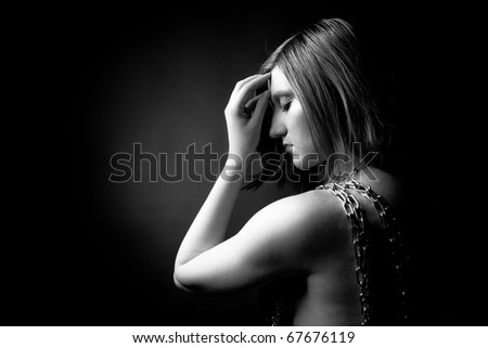 Woman with chain thinking