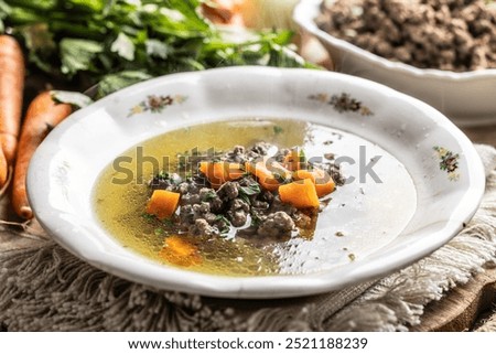 Similar – Image, Stock Photo Bavarian liver dumpling soup on wood