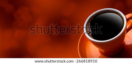 Cup of black coffee on bokeh background. Banner of a cup of coffee and a blurred background