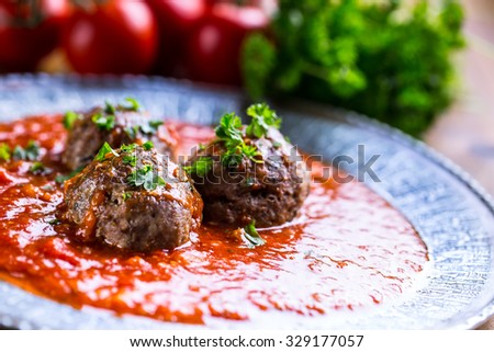 Meat balls. Italian and Mediterranean cuisine. Meat balls with spaghetti and tomato sauce. traditional kitchen.