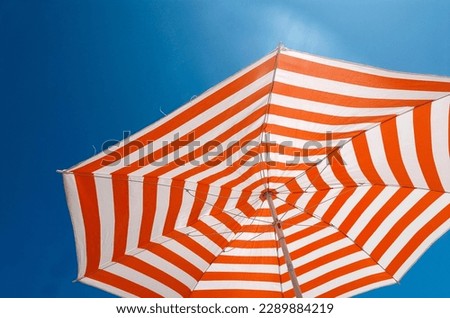 Similar – Image, Stock Photo orange parasol with blue sky