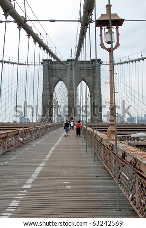 NEW YORK - CIRCA JULY 2009: The Brooklyn bridge circa July 2009 in New York City. The Brooklyn Bridge is one of the oldest suspension bridges in the United States.