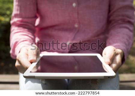 Woman to operate the tablet device