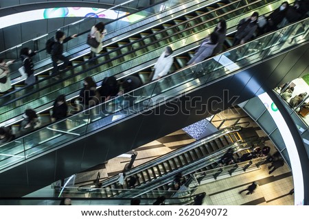 Businessmen to move the escalator in the office above high Angle view