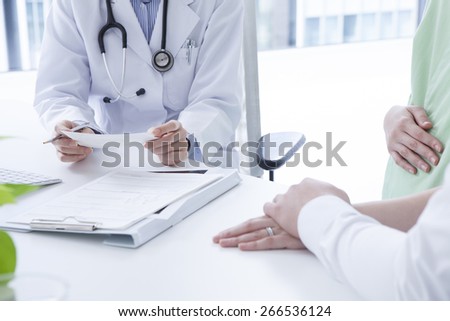 Couple during visit at doctor\'s office