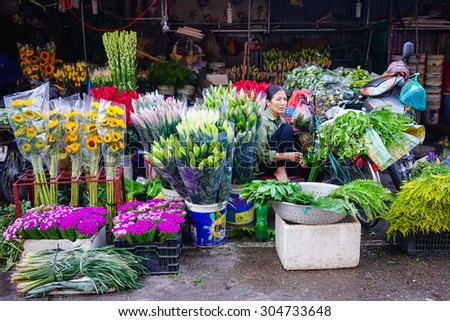 Hanoi, Vietnam - July 12, 2015: Fresh flowers on shop in Quangba Flower Market in Hanoi. Quang Ba market is considered the only flower wholesale market in Hanoi.