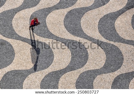 Woman on paving
