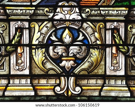 NEW ORLEANS, LOUISIANA-JUNE 15, 2012:  Stained glass window with religious motif at Saint Louis Cathedral in the New Orleans French Quarter on June 15, 2012.