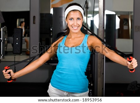 Attractive young woman in health club