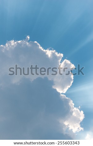 Beautiful background bright sun shines through clouds, light rays and other atmospheric effect