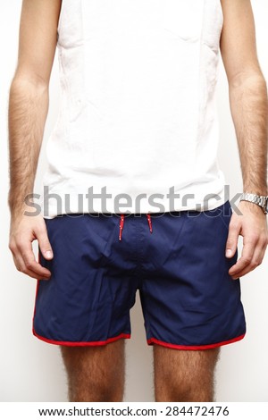 man in swimming trunks, swimsuit, blue swimming trunks, young man in swimming trunks