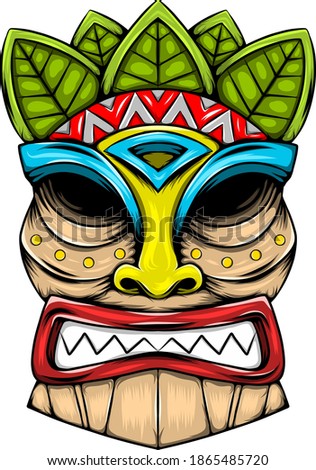 The traditional tiki island mask made from the wood with the leaves accent