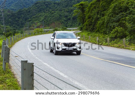 Hanoi, Vietnam - July 17, 2015: Mazda CX-5 car running on the mountain road in Vietnam