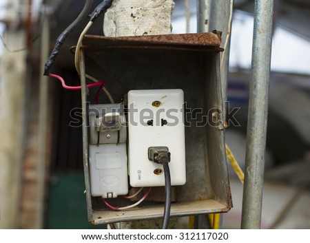 Hanoi, Vietnam - Aug 30, 2015: Old electricity switch, breaker in Vietnam