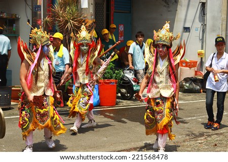 Taiwan Hsinchu - May 16: In the township in Hsinchu, Taiwan temple folk acrobatics May 16, 2013. Chinese Lunar New Year Fair held in May each year.