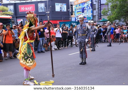 Hsinchu, Taiwan -2015-aug 27: The Messenger of God, face painting in Hsinchu, Taiwan to stop the fierce ghost firecrackers in Ghost Festival August 27