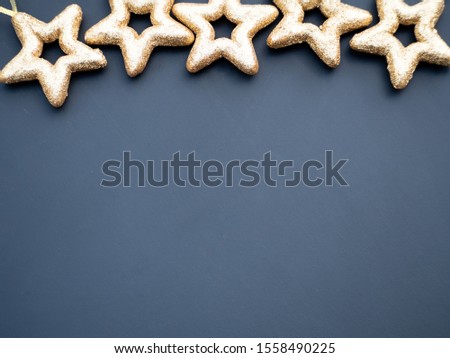 Simple Christmas background concept featuring gold stars on a dark background. Copy space for your text. Zdjęcia stock © 