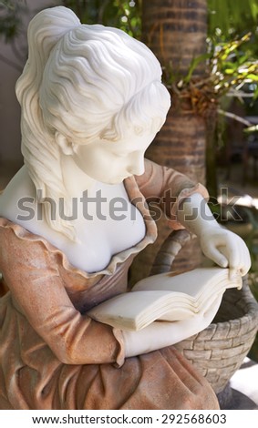 female sculpture in the garden