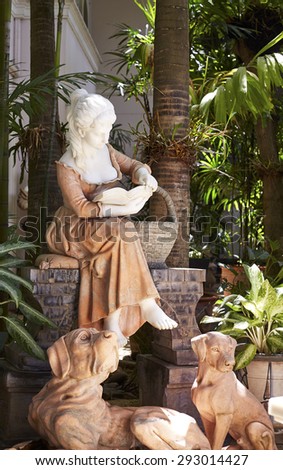 female sculpture in the garden