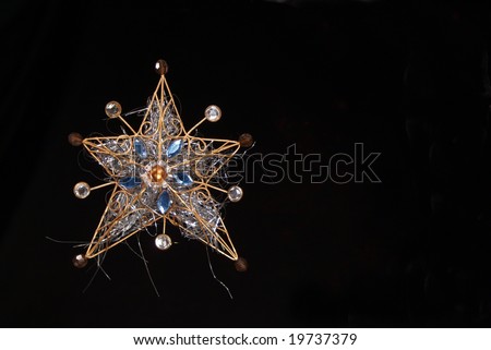 Christmas Star Ornament on Left