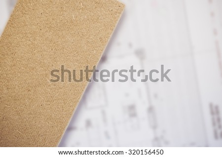 compressed thermal insulating hemp fiber panels close up view - building plan background