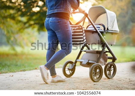 Similar – Image, Stock Photo Young mother walking with her little daughter in the green field. Family holiday in garden. Portrait mom with child together on nature. Mum, little daughter outdoors. Happy Mothers Day. Close up.