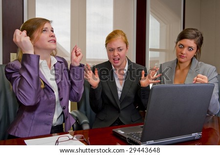 Woman Meeting Showing Frustration with Computer