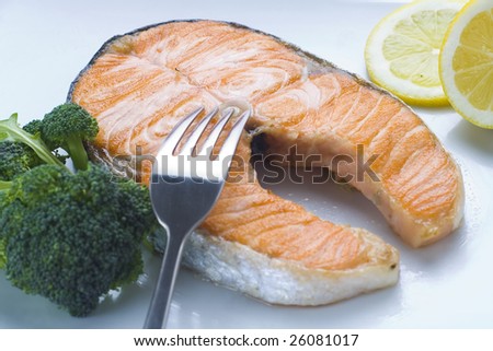 fresh salmon cooked with tomato salad broccoli salad