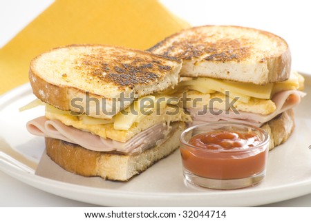 tasty sandwich of ham and cheese omelet isolated