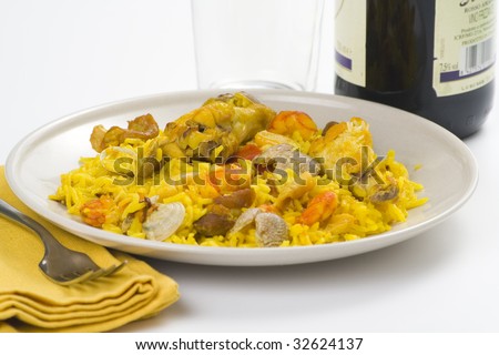 delicious seafood paella and chicken rice yellow isolated