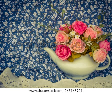 Flower in a white tea pot and vintage , cozy home rustic decor, cottage living